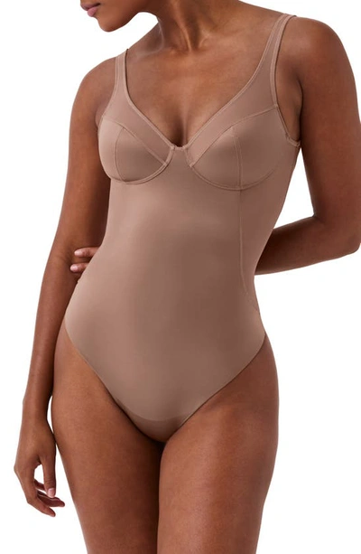 Shop Spanx Shaping Satin Thong Bodysuit In Cafe Au Lait