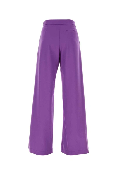 Shop Msgm Pants In Purple