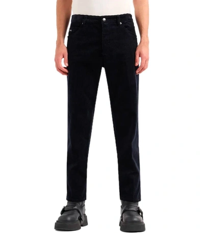 Shop Emporio Armani J69 Navy Blue Ribbed Trousers