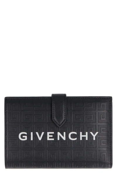 Shop Givenchy G Cut Leather Wallet In Black