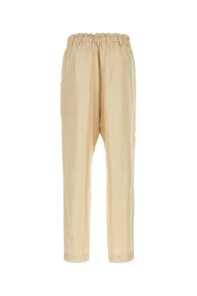 Saint Laurent Trousers With Front Pleats And Back Pockets In Stripped