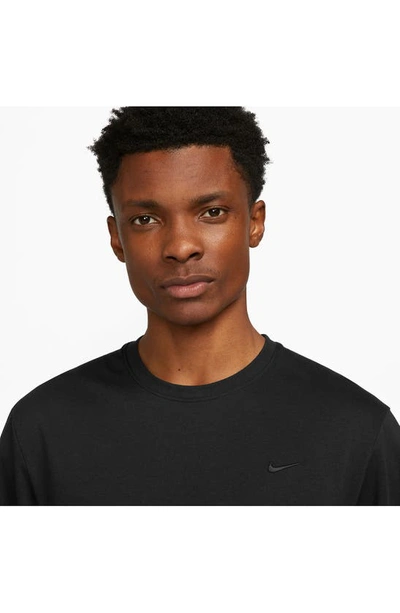 Shop Nike Dri-fit Primary Long Sleeve T-shirt In Black/ Black