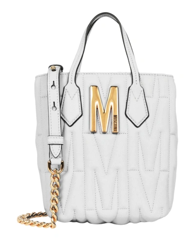 Shop Moschino Quilted Monogram Shoulder Bag In White