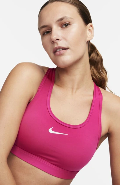 Shop Nike Dri-fit Padded Sports Bra In Fireberry/ White
