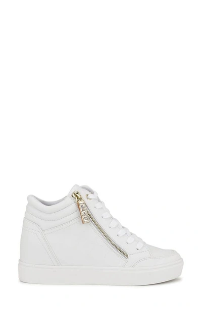 Shop Nine West Tons Lace-up Wedge Sneaker In White