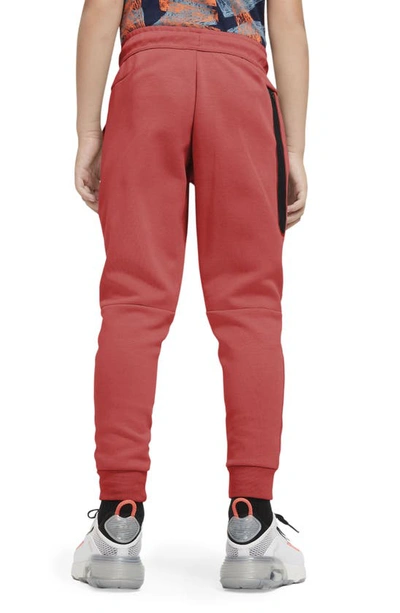 Shop Nike Tech Fleece Pants In Lobster/black
