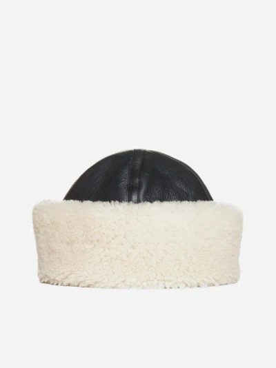 Shop Totême Leather And Shearling Hat In Black,off White