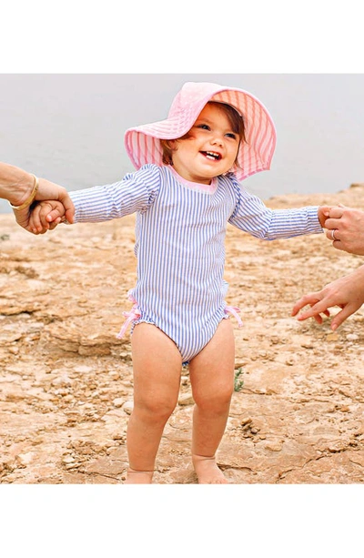 Shop Rufflebutts Seersucker One-piece Rashguard Swimsuit & Hat Set In Periwinkle Seersucker