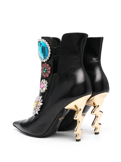 Shop Moschino Boots In Black