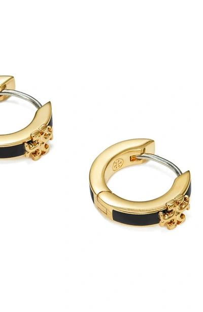 Shop Tory Burch Kira Enamel Huggie Earrings In Tory Gold / Black