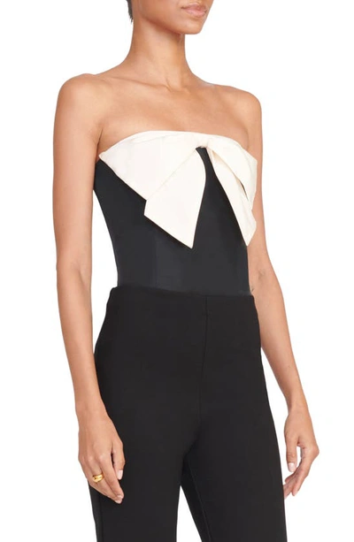 Shop Staud Atticus Contrast Bow Strapless Top In Black/ivory