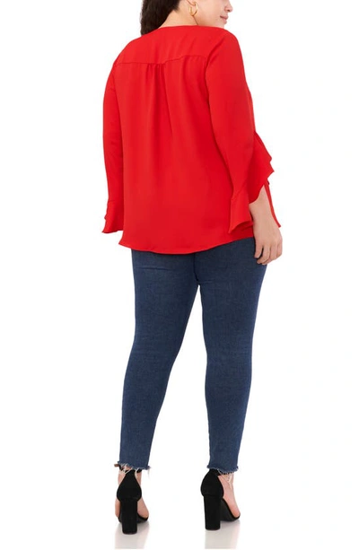 Shop Vince Camuto Flutter Sleeve Crossover Georgette Tunic Top In Ultra Red