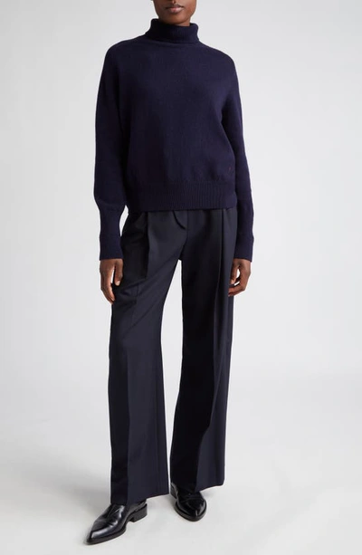Shop Victoria Beckham Pleated Wide Leg Trousers In Midnight