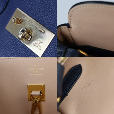 Leather bag Louis Vuitton Navy in Leather - 29970314