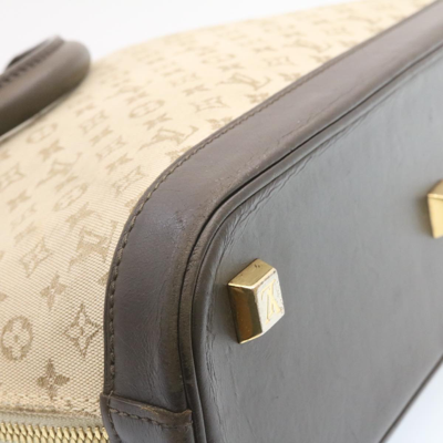 Louis Vuitton Handbag in Beige Fabric – Fancy Lux