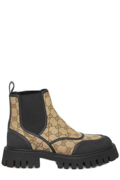 Shop Gucci Monogrammed Ankle Boots In Beige