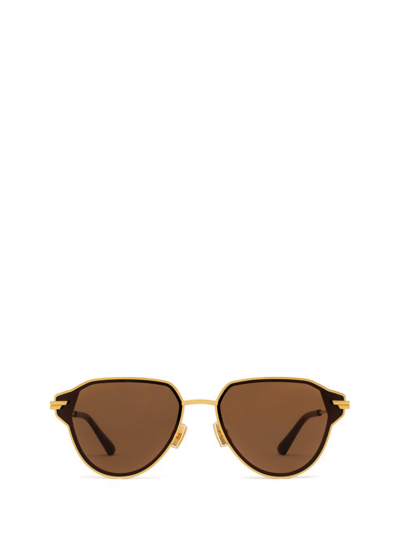 Shop Bottega Veneta Eyewear Aviator Frame Sunglasses In Gold