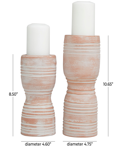 Shop Rosemary Lane Ceramic Whitewashed Ribbed Terracotta Candle Holder 11" And 9" H, Set Of 2 In Pink