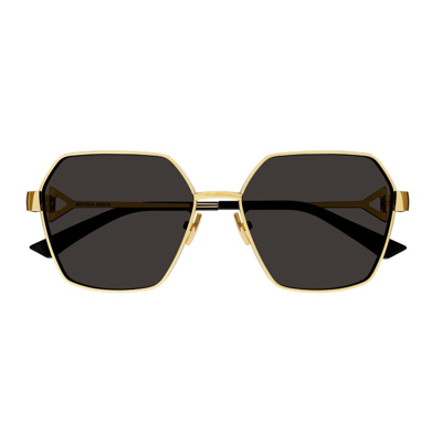 Shop Bottega Veneta Eyewear Geometric Frame Sunglasses In Gold