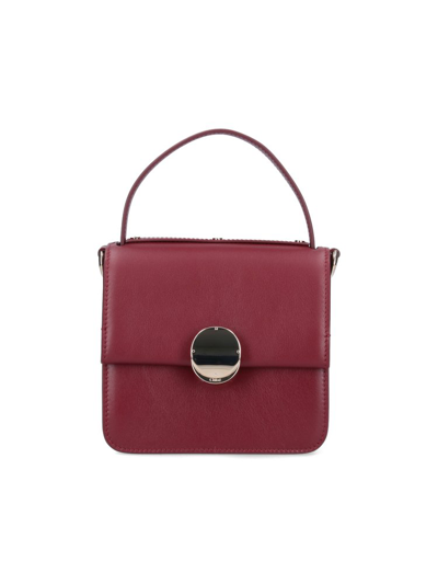 Shop Chloé Penelope Small Top Handle Bag In Red
