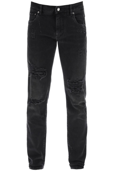 Shop Dolce & Gabbana Ripped Skinny Jeans In Black