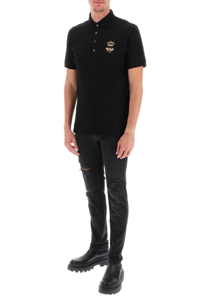 Shop Dolce & Gabbana Ripped Skinny Jeans In Black