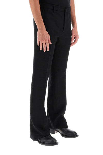 Shop Etro Flared Pants In Virgin Wool In Black