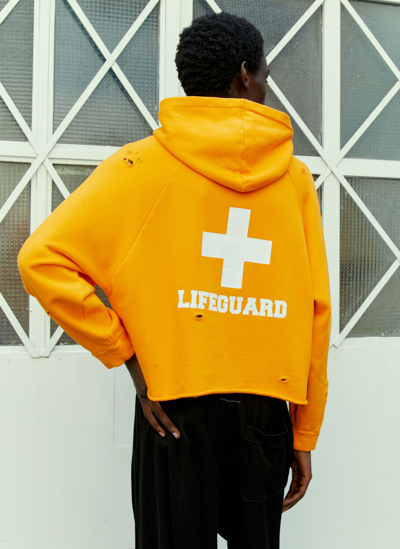 Shop Liberal Youth Ministry Lifeguard Distressed Hooded Sweatshirt In Orange
