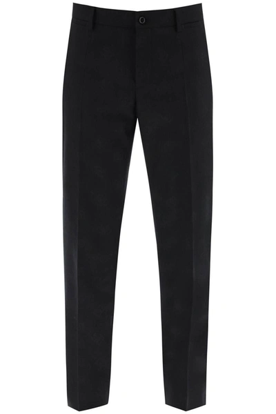 Shop Dolce & Gabbana Pants With Jacquard Dg Motif In Black