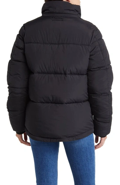 Shop The Very Warm Hooded Water Resistant 500 Fill Power Down Recycled Nylon Puffer Jacket In Black