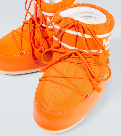 Shop Moon Boot Icon Low Snow Boots In Orange