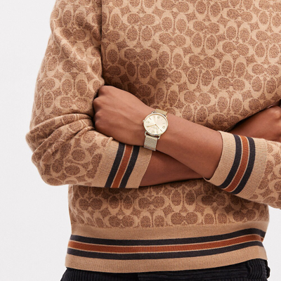 Coach In Gold