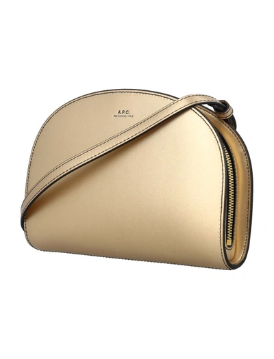 Shop Apc Demi-lune Clutch Bag In Gold
