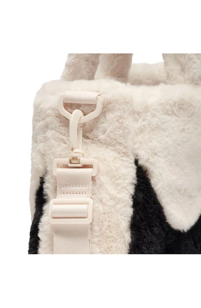 Shop Nike Sportswear Faux Fur Tote Bag In Guava Ice/ Guava Ice/ Black