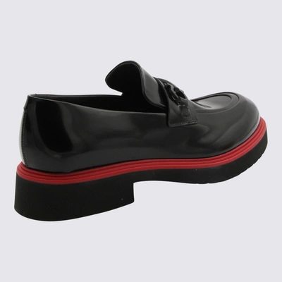 Shop Ferragamo Black And Red Leather Fiorello Loafers In Black-red