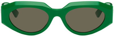 Shop Bottega Veneta Green Oval Sunglasses In Green-green-green