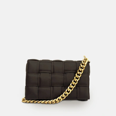Shop Apatchy London Chocolate Padded Woven Leather Crossbody Bag With Gold Chain Strap In Black