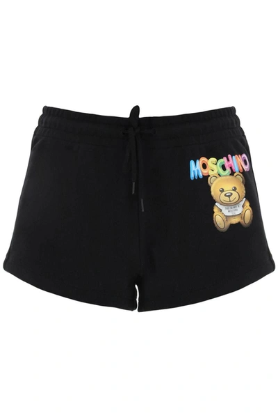 Shop Moschino Logo Printed Shorts In Black
