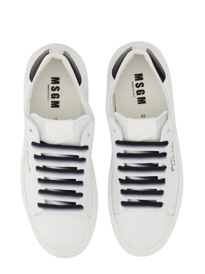 Shop Msgm Leather Sneaker In White