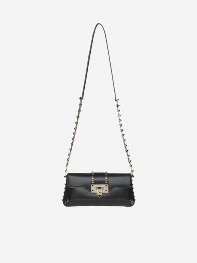 Shop Valentino Rockstud Small Leather Bag In Black