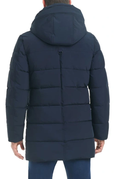 Shop Vince Camuto Quilted Hooded Water Resistant Puffer Coat With Bib In Navy