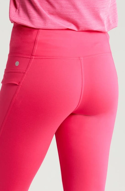 Shop Zella Fleece Lined Performance Pocket Leggings In Pink Bright