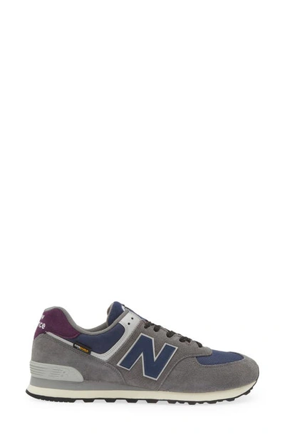 Shop New Balance Gender Inclusive 574 Sneaker In Grey/ Navy/ Purple