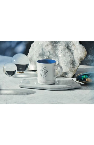 Shop Le Creuset Zodiac Stoneware Mug In White/ Blue