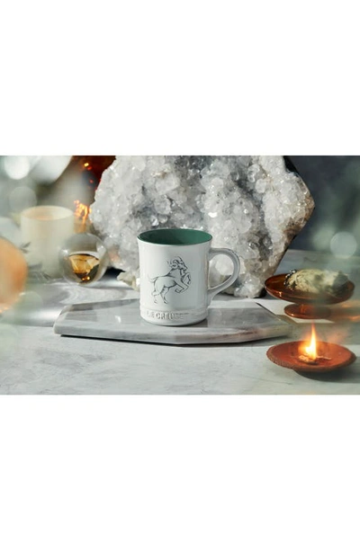 Shop Le Creuset Zodiac Stoneware Mug In White/ Green