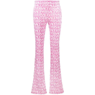 Shop Versace Pants In Pink/white