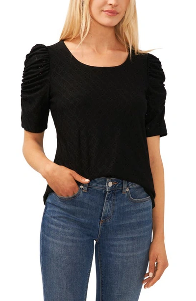 Shop Cece Eyelet Puff Sleeve Top In Rich Black