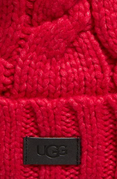 Shop Ugg Cable Knit Pom Beanie In Cerise