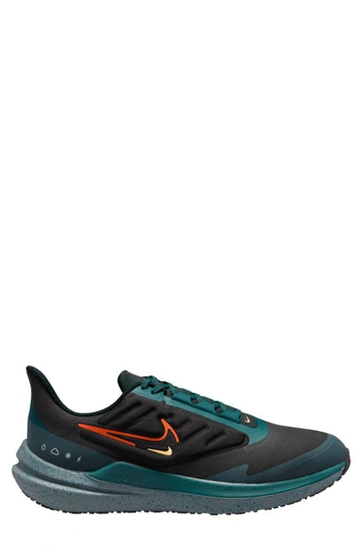 Shop Nike Air Winflo 9 Water Repellent Running Shoe In Black/ Safety Orange
