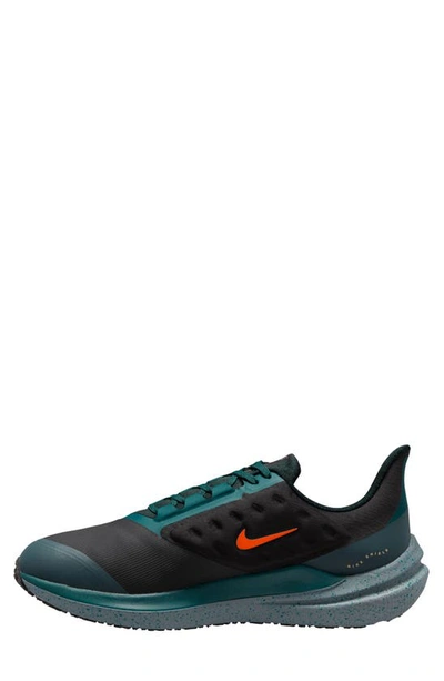 Shop Nike Air Winflo 9 Water Repellent Running Shoe In Black/ Safety Orange